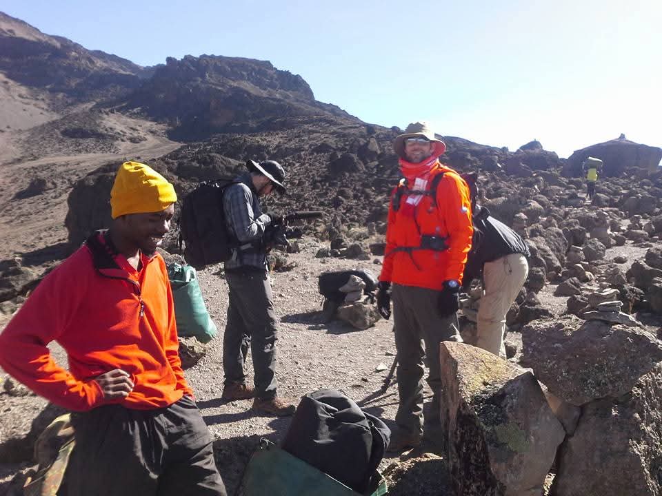 Climbers on a rocky Kilimanjaro trail